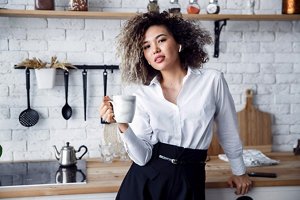 Young woman with dark and blonde skunk hairstyle